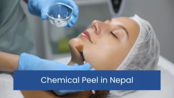 A person receives a chemical peel in Nepal on their face in a spa setting, wearing a hairnet. Aesthetician with gloved hands applies the peel, conveying relaxation.