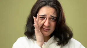 sad women due to the visible under eye dark circle